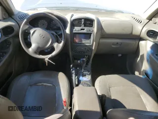 2004 Hyundai Santa Fe GLS with VIN KM8SC13E14U601747, listed as a Copart auction lot 76769864 with 190,446 mi miles and Salvage Title. Bid and sale history available at carsss.com. Image 8.