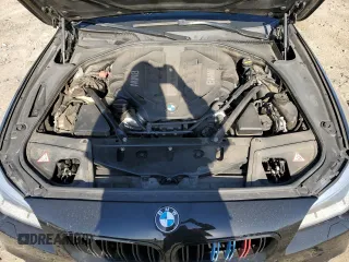2016 BMW 5 Series 550i xDrive z VIN WBAKP9C54GD980929, wystawiony jako Copart lot #49449355 z przebiegiem 186 549 mil mil oraz Szkoda całkowita • Salvage title. Historia ofert i sprzedaży dostępna na DreamBid. Obrazek 11.