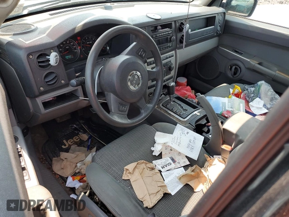 2006 Jeep Commander z VIN 1J8HG48K16C195599, wystawiony jako Copart lot #59402935 z przebiegiem 184 157 mil mil oraz Szkoda całkowita • Salvage title. Historia ofert i sprzedaży dostępna na DreamBid. Obrazek 8.