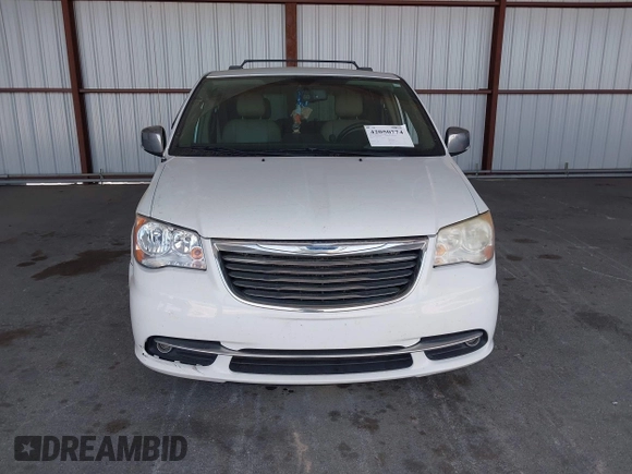 2014 Chrysler Town & Country Touring-L with VIN 2C4RC1CG2ER312444, listed as a IAAI auction lot 42050774 with 124,010 mi miles. Bid and sale history available at carsss.com. Image 12.