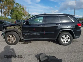 2017 Jeep Grand Cherokee Laredo with VIN 1C4RJEAG5HC663930, listed as a IAAI auction lot 41684918 with 91,063 mi miles. Bid and sale history available at carsss.com. Image 15.