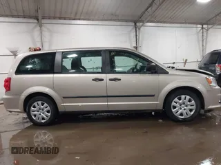 2015 Dodge Grand Caravan SE with VIN 2C4RDGBG2FR592899, listed as a IAAI auction lot 41309499 with 110,428 mi miles and . Bid and sale history available at DreamBid. Image 13.