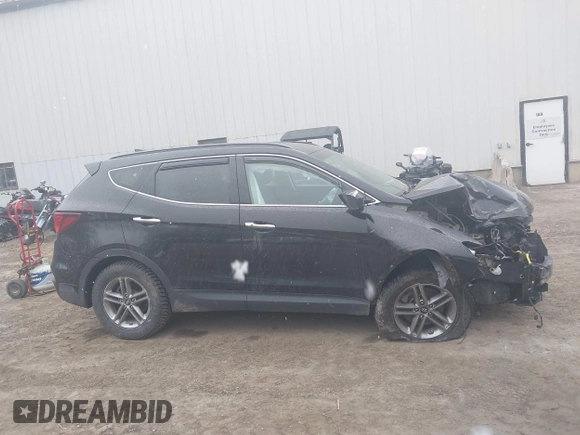 2018 Hyundai Santa Fe 2.4L z VIN 5NMZUDLB7JH098638, wystawiony jako IAAI lot #42055793 z przebiegiem 63 516 mil mil oraz . Historia ofert i sprzedaży dostępna na DreamBid. Obrazek 13.
