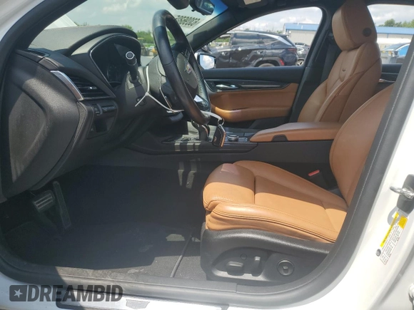 2020 Cadillac CT5 Premium Luxury с VIN 1G6DT5RK4L0127464, выставлен на аукционе Copart как лот 63096805 с пробегом 22 380 миль миль и Списание • Salvage title. История ставок и продаж доступна на DreamBid. Изображение 7.