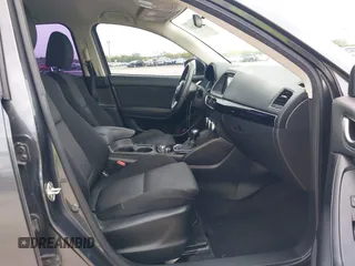 2016 Mazda CX-5 Sport with VIN JM3KE4BY8G0921243, listed as a IAAI auction lot 42102663 with 111,960 mi miles and . Bid and sale history available at DreamBid. Image 5.