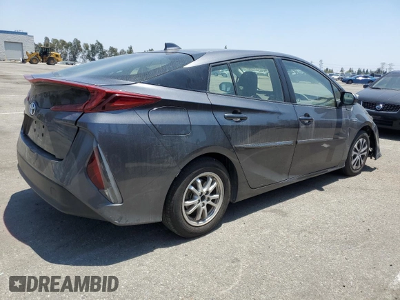 2021 Toyota Prius LE z VIN JTDKAMFPXM3174518, wystawiony jako Copart lot #58854495 z przebiegiem 83 445 mil mil oraz Szkoda całkowita • Salvage title. Historia ofert i sprzedaży dostępna na DreamBid. Obrazek 3.