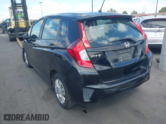 2015 Honda Fit LX z VIN 3HGGK5H52FM765921, wystawiony jako IAAI lot #42135740 z przebiegiem 82 647 mil mil oraz . Historia ofert i sprzedaży dostępna na DreamBid. Obrazek 3.