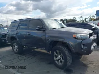 2018 Toyota 4Runner SR5 with VIN JTEBU5JR7J5606564, listed as a IAAI auction lot 41408904 with 149,936 mi miles. Bid and sale history available at carsss.com. Image 14.