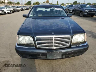 1999 Mercedes-Benz S with VIN WDBGA57G5XA428158, listed as a Copart auction lot 65543515 with 65,698 mi miles and Salvage title. Bid and sale history available at DreamBid. Image 5.