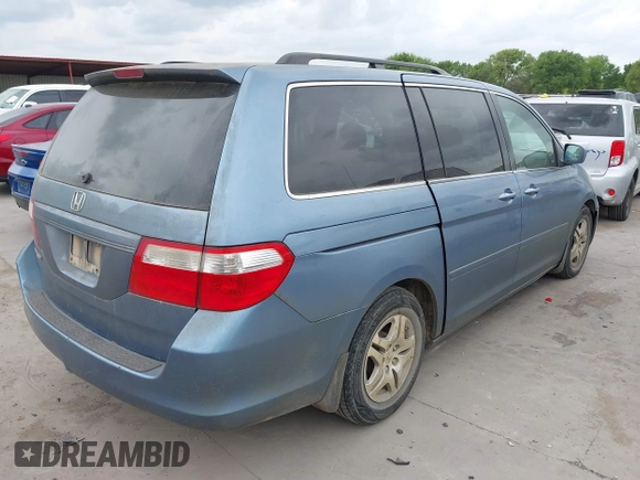 2007 Honda Odyssey EX-L with VIN 5FNRL38717B127157, listed as a IAAI auction lot 41890838 with 195,241 mi miles and . Bid and sale history available at DreamBid. Image 4.
