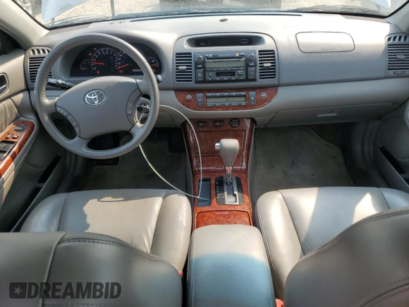 2006 Toyota Camry LE z VIN 4T1BF30K66U115872, wystawiony jako Copart lot #60526695 z przebiegiem 164 561 mil mil oraz Szkoda całkowita • Salvage title. Historia ofert i sprzedaży dostępna na DreamBid. Obrazek 8.