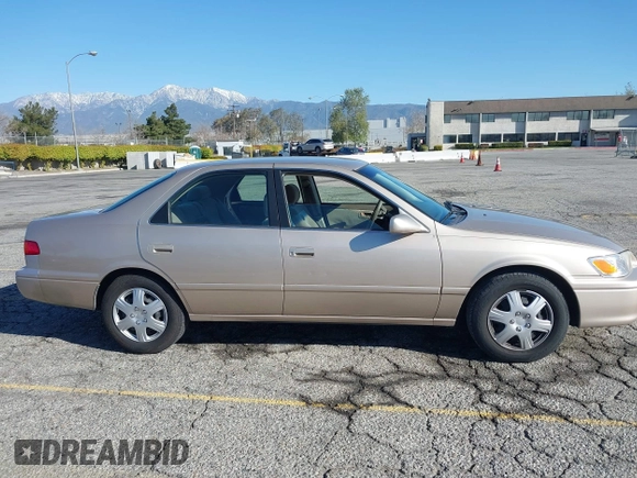 2001 Toyota Camry CE with VIN JT2BG22KX10559757, listed as a IAAI auction lot 41823719 with 72,775 mi miles. Bid and sale history available at carsss.com. Image 13.