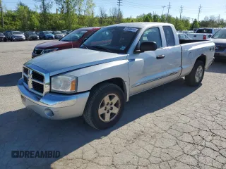 2005 Dodge Dakota with VIN 1D7HW52J35S322198, listed as a Copart auction lot 47046414 with 122,879 mi miles and Salvage title. Bid and sale history available at DreamBid. Image 1.