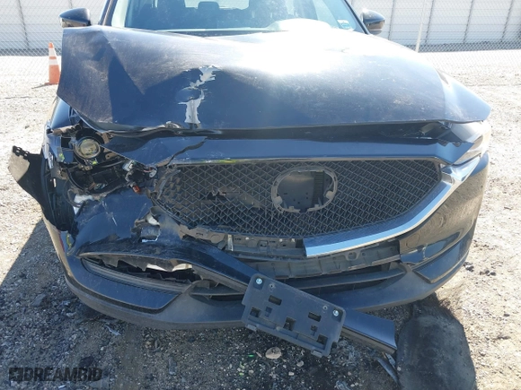 2017 Mazda CX-5 Sport with VIN JM3KFBBL2H0144792, listed as a IAAI auction lot 41654031 with 77,107 mi miles. Bid and sale history available at carsss.com. Image 6.