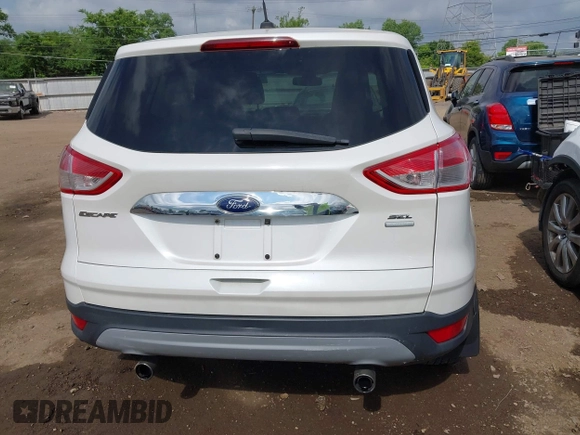 2013 Ford Escape SEL with VIN 1FMCU9HX6DUB14053, listed as a IAAI auction lot 42361297 with 144,861 mi miles and . Bid and sale history available at DreamBid. Image 16.