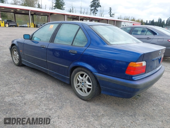 1998 BMW 3 Series 328iA with VIN WBACD4325WAV64684, listed as a IAAI auction lot 42032472 with 240,264 mi miles. Bid and sale history available at carsss.com. Image 3.