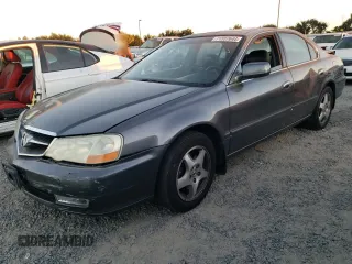 2002 Acura TL w/Navigation with VIN 19UUA56782A048974, listed as a Copart auction lot 71557644 with 124,848 mi miles and Salvage Title. Bid and sale history available at carsss.com. Image 1.