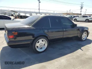 1994 Mercedes-Benz 400 E z VIN WDBEA34E6RC103296, wystawiony jako Copart lot #57000855 z przebiegiem 186 177 mil mil oraz Czysty tytuł • Clean title. Historia ofert i sprzedaży dostępna na DreamBid. Obrazek 3.