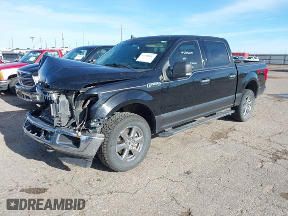 2020 Ford F-150 XL with VIN 1FTEW1E41LFA14450, listed as a IAAI auction lot 42148087 with 184,168 mi miles and . Bid and sale history available at DreamBid. Image 2.