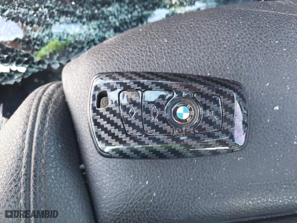 2016 BMW 2 Series 228i with VIN WBA1F5C53GV343757, listed as a IAAI auction lot 39804829 with 100,965 mi miles. Bid and sale history available at carsss.com. Image 11.