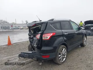 2014 Ford Escape SE z VIN 1FMCU9G94EUD64427, wystawiony jako IAAI lot #41965103 z przebiegiem 66 429 mil mil oraz . Historia ofert i sprzedaży dostępna na DreamBid. Obrazek 4.