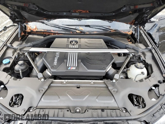 2023 BMW X3 M with VIN 5YM13EC02P9R76895, listed as a Copart auction lot 84182294 with 17,257 mi miles and Salvage title. Bid and sale history available at DreamBid. Image 12.