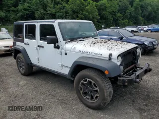 2014 Jeep Wrangler Unlimited Rubicon with VIN 1C4HJWFG4EL114743, listed as a Copart auction lot 61397575 with 110,222 mi miles and Salvage title. Bid and sale history available at DreamBid. Image 4.