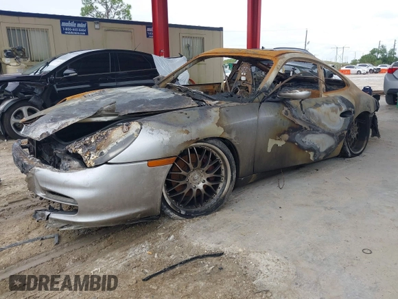 2004 Porsche 911 Carrera z VIN WP0AA29974S621731, wystawiony jako IAAI lot #40538243 z przebiegiem Nie podano mil oraz . Historia ofert i sprzedaży dostępna na DreamBid. Obrazek 2.