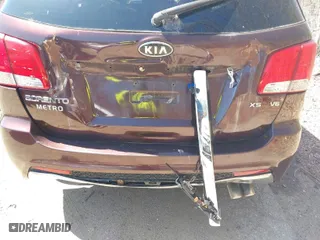2011 Kia Sorento SX with VIN 5XYKWDA28BG122133, listed as a IAAI auction lot 41973379 with 185,627 mi miles. Bid and sale history available at carsss.com. Image 6.