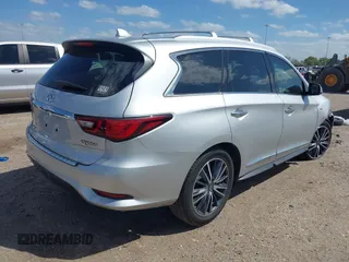 2019 Infiniti QX60 LUXE with VIN 5N1DL0MN8KC526839, listed as a IAAI auction lot 41811271 with 83,729 mi miles. Bid and sale history available at carsss.com. Image 4.