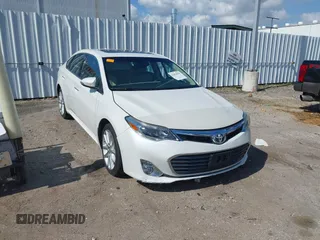 2013 Toyota Avalon XLE z VIN 4T1BK1EB2DU041971, wystawiony jako IAAI lot #42070838 z przebiegiem 89 299 mil mil oraz . Historia ofert i sprzedaży dostępna na DreamBid. Obrazek 1.