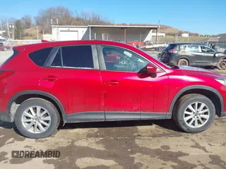 2016 Mazda CX-5 Touring with VIN JM3KE4CY4G0860035, listed as a IAAI auction lot 41678299 with 72,101 mi miles. Bid and sale history available at carsss.com. Image 13.