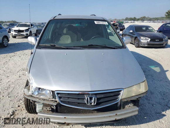 2003 Honda Odyssey EX z VIN 5FNRL18673B014271, wystawiony jako Copart lot #68613374 z przebiegiem 236 360 mil mil oraz Nie do naprawy • Non repairable. Historia ofert i sprzedaży dostępna na DreamBid. Obrazek 5.