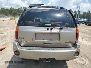 2002 GMC Envoy SLT z VIN 1GKDS13S922263923, wystawiony jako Copart lot #59234395 z przebiegiem Nie podano mil oraz Szkoda całkowita • Salvage title. Historia ofert i sprzedaży dostępna na DreamBid. Obrazek 6.