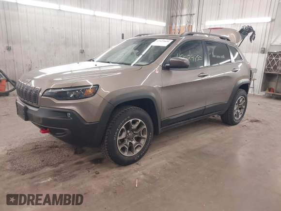 2021 Jeep Cherokee Trailhawk z VIN 1C4PJMBX5MD231018, wystawiony jako IAAI lot #42029850 z przebiegiem 66 525 mil mil oraz . Historia ofert i sprzedaży dostępna na DreamBid. Obrazek 18.