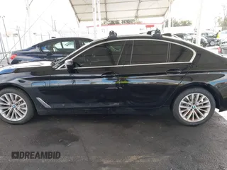 2021 BMW 5 Series 530e with VIN WBA13AG07MCF87003, listed as a IAAI auction lot 41550152 with 52,214 mi miles and . Bid and sale history available at carsss.com. Image 14.