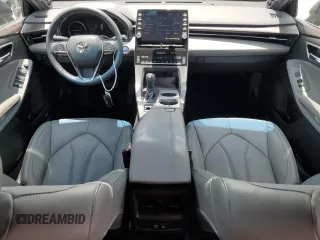 2021 Toyota Avalon Hybrid XLE z VIN 4T1AA1AB8MU007487, wystawiony jako Copart lot #57241445 z przebiegiem 63 154 mil mil oraz Nie do naprawy • Non repairable. Historia ofert i sprzedaży dostępna na DreamBid. Obrazek 8.