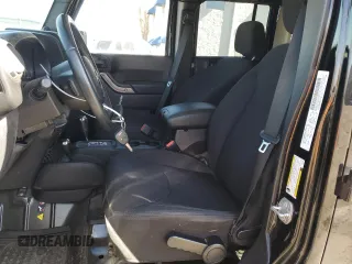 2014 Jeep Wrangler Unlimited Sport with VIN 1C4BJWDG8EL207287, listed as a Copart auction lot 49522335 with 67,472 mi miles and Salvage Title. Bid and sale history available at carsss.com. Image 7.
