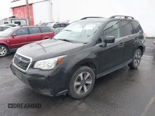 2018 Subaru Forester Premium with VIN JF2SJGEC4JH581718, listed as a IAAI auction lot 41988454 with 76,376 mi miles. Bid and sale history available at carsss.com. Image 17.