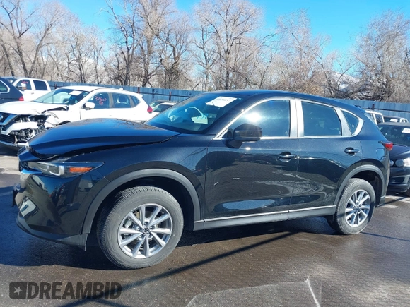 2023 Mazda CX-5 2.5 S with VIN JM3KFBAM9P0230299, listed as a IAAI auction lot 41656657 with 17,290 mi miles. Bid and sale history available at carsss.com. Image 15.