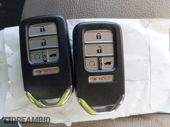 2022 Honda Pilot EX-L with VIN 5FNYF6H58NB097283, listed as a IAAI auction lot 40944566 with 22,027 mi miles and . Bid and sale history available at DreamBid. Image 11.