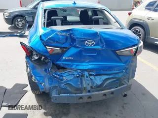 2019 Toyota Yaris L with VIN 3MYDLBYV2KY520621, listed as a IAAI auction lot 42278402 with 57,118 mi miles and . Bid and sale history available at DreamBid. Image 6.