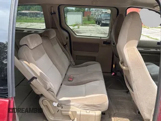 2005 Ford Freestar SES с VIN 2FMZA57605BA82597, выставлен на аукционе Copart как лот 61200505 с пробегом 188 210 миль миль и Чистый • Clean title. История ставок и продаж доступна на DreamBid. Изображение 6.