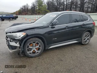 2018 BMW X1 xDrive28i with VIN WBXHT3C31J5F89068, listed as a Copart auction lot 52266655 with 145,375 mi miles and Clean Title. Bid and sale history available at carsss.com. Image 1.