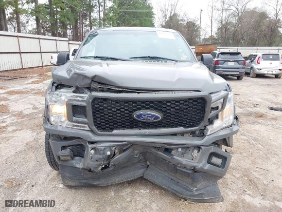 2018 Ford F-150 XL with VIN 1FTEW1CP4JFD00156, listed as a IAAI auction lot 41571979 with 153,167 mi miles. Bid and sale history available at carsss.com. Image 6.