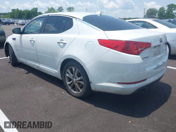 2013 Kia Optima EX z VIN 5XXGN4A70DG121117, wystawiony jako IAAI lot #42387582 z przebiegiem 314 327 mil mil oraz . Historia ofert i sprzedaży dostępna na DreamBid. Obrazek 3.