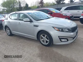 2014 Kia Optima LX with VIN 5XXGM4A71EG337837, listed as a IAAI auction lot 42251696 with 115,063 mi miles and . Bid and sale history available at DreamBid. Image 1.
