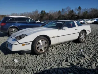 1989 Chevrolet Corvette with VIN 1G1YY2188K5117660, listed as a Copart auction lot 87948715 with 33,388 mi miles and Salvage Title. Bid and sale history available at carsss.com. Image 1.