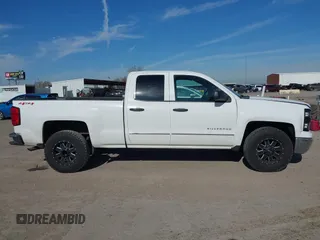2014 Chevrolet Silverado 1500 LT with VIN 1GCVKREH4EZ343111, listed as a IAAI auction lot 41339803 with 185,314 mi miles and . Bid and sale history available at DreamBid. Image 13.