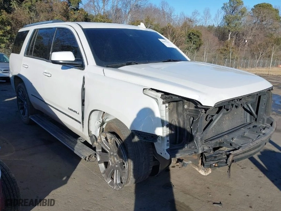 2016 GMC Yukon Denali with VIN 1GKS2CKJ1GR363542, listed as a IAAI auction lot 41435129 with 180,289 mi miles. Bid and sale history available at carsss.com. Image 1.